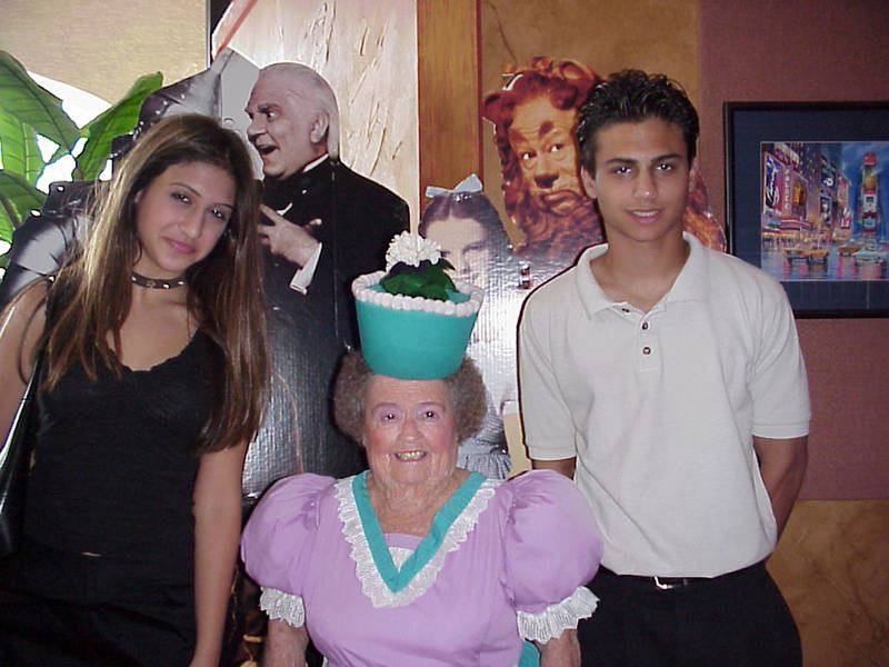 Taken years ago with my children, now adults, Sheena and Shaun, the picture centers on one of the actors from the 1939 classic, The Wizard of Oz. She is Margaret Pellegrini of Glendale, Arizona - a flower-pot girl. She recently died.